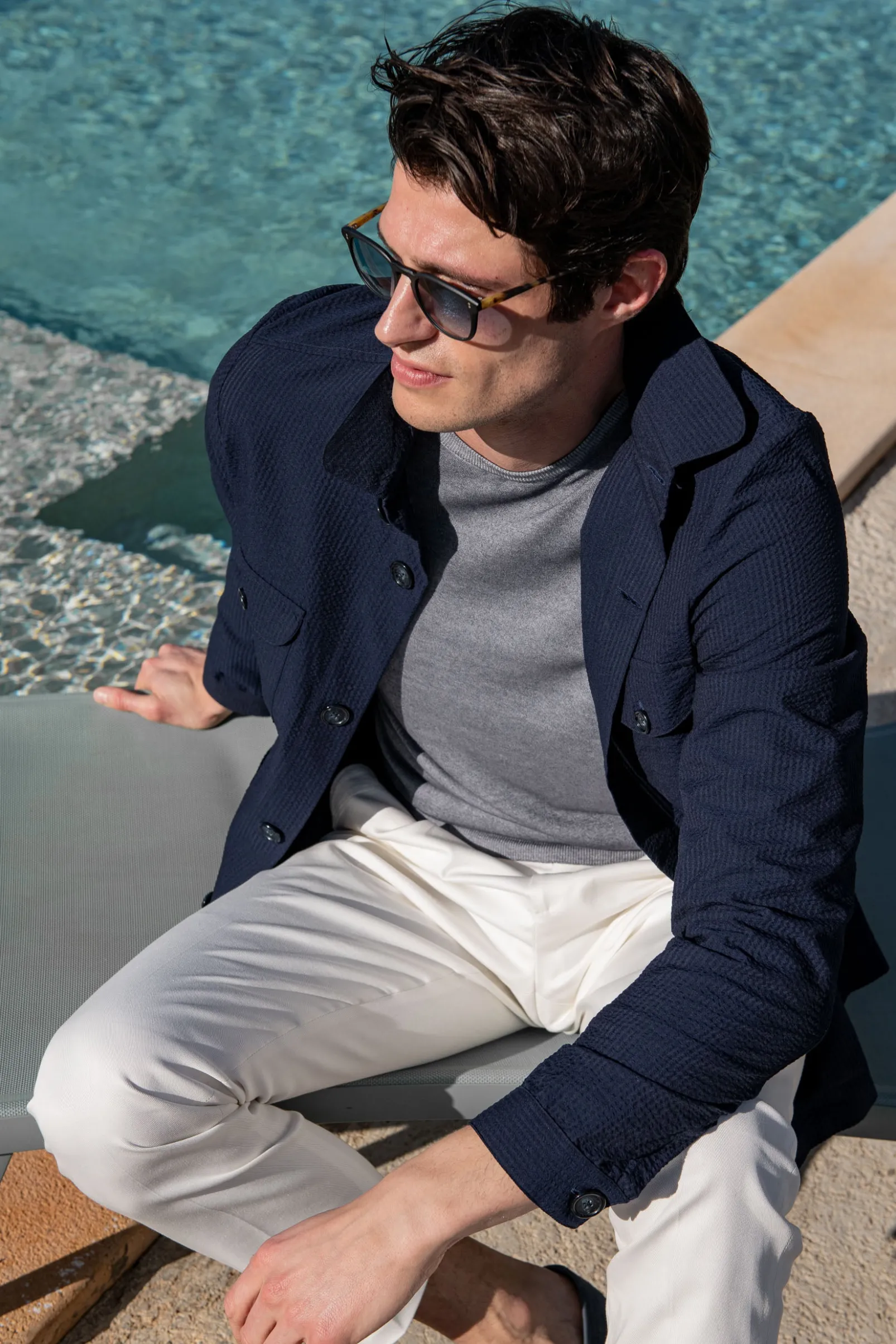blue_safari_jacket_in_see_1.webp Blue Safari Jacket in seersucker – Made in Italy