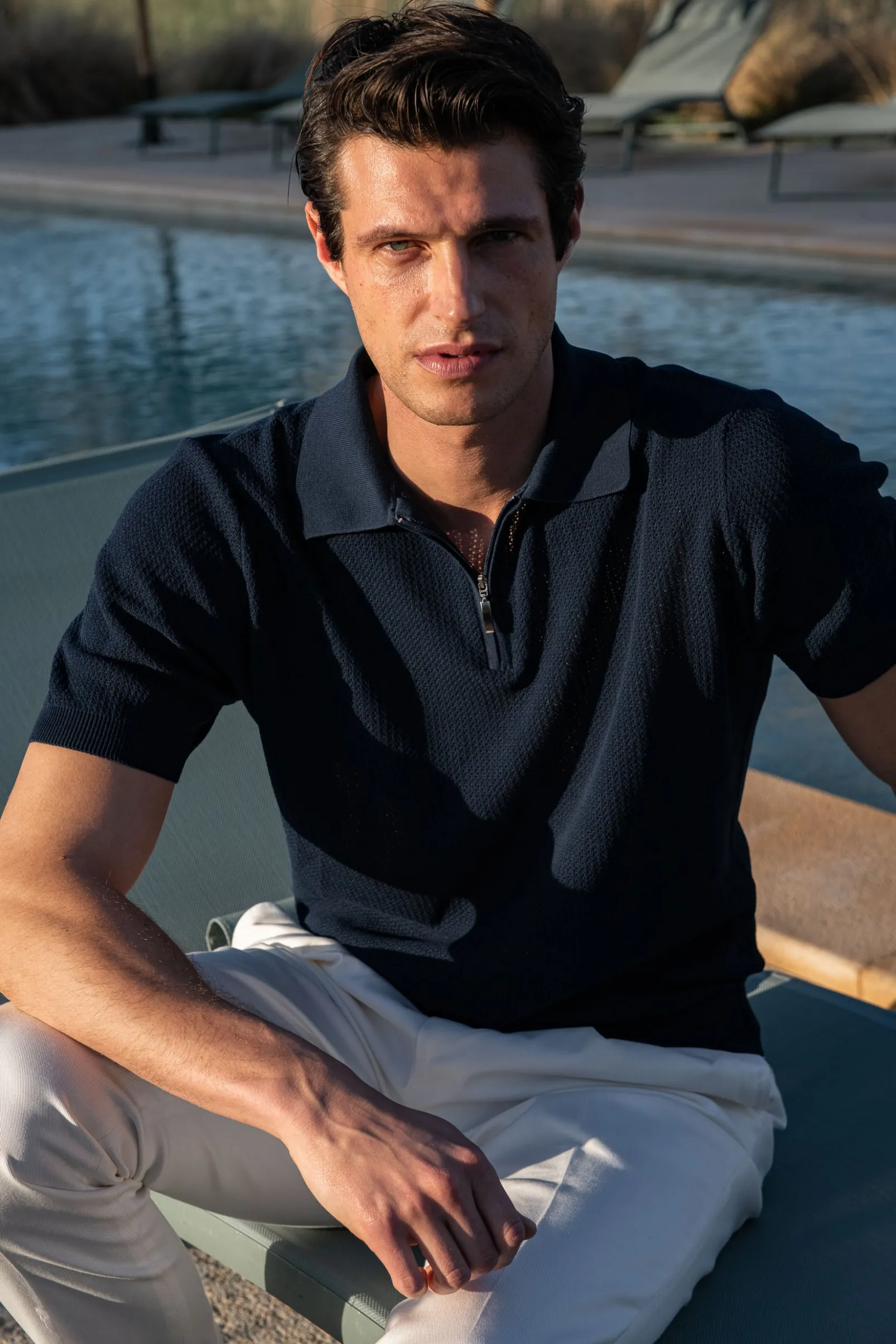blue_textured_knit_polo_w_0.webp Blue textured knit polo with zip - Made in Italy