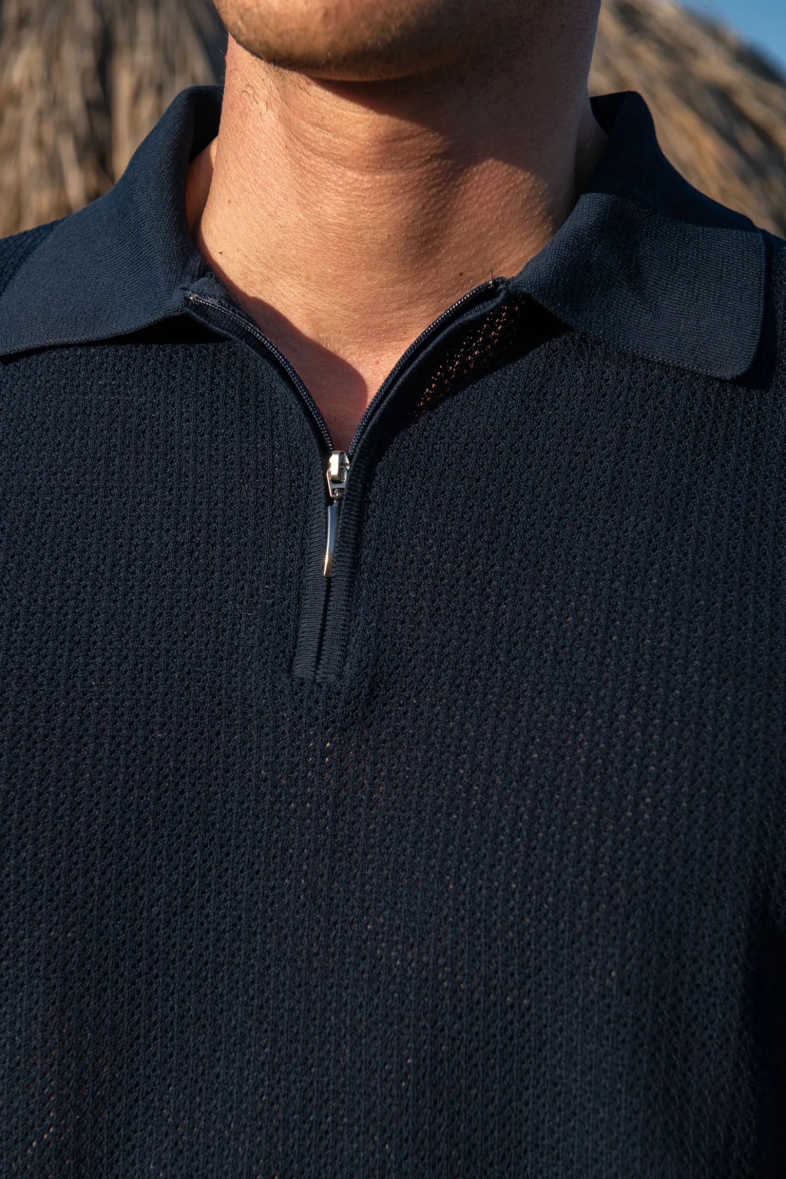 blue_textured_knit_polo_w_1.webp Blue textured knit polo with zip - Made in Italy