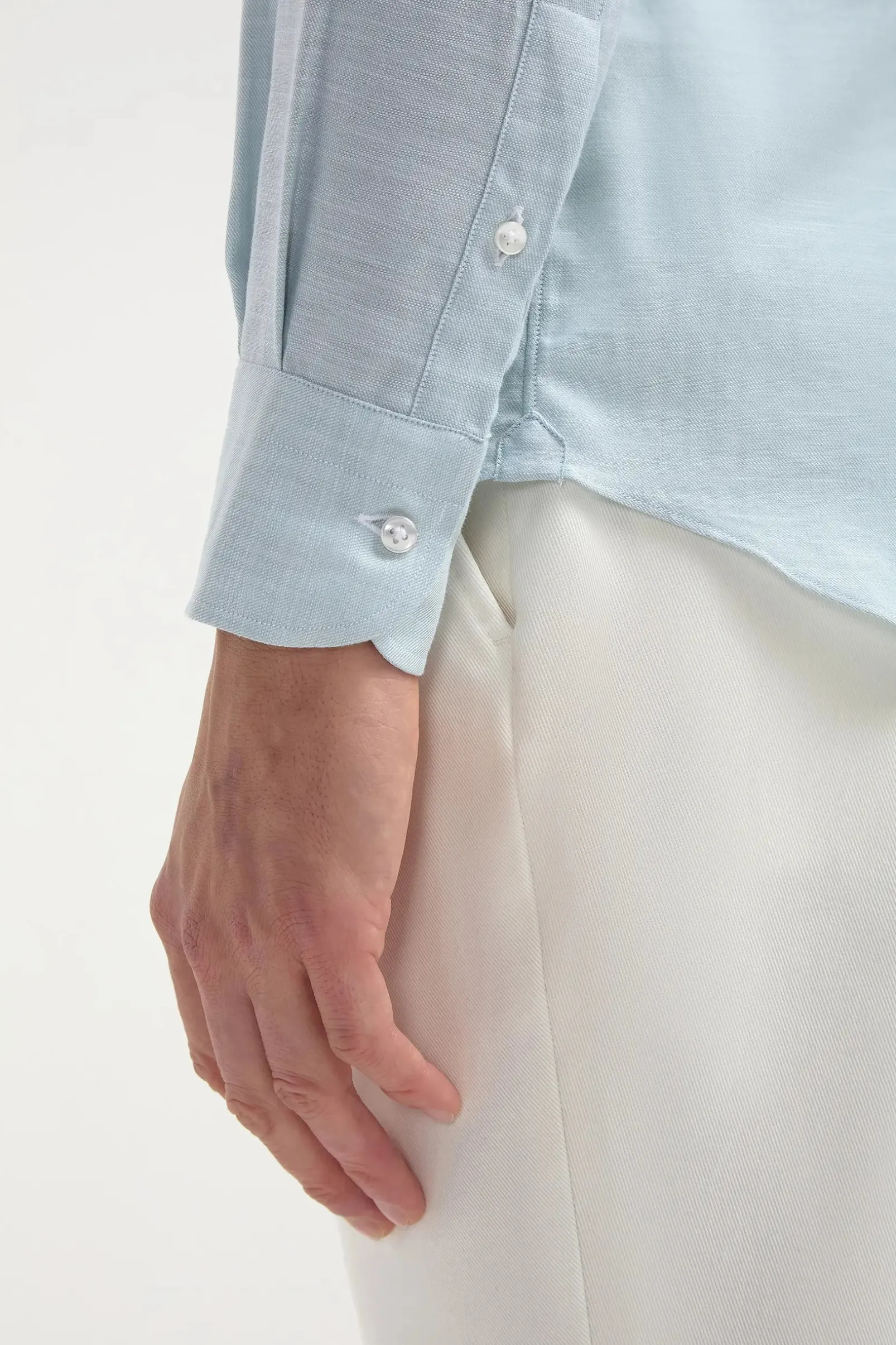 water_green_chambray_butt_2.webp Water green chambray button down shirt - Made in Italy