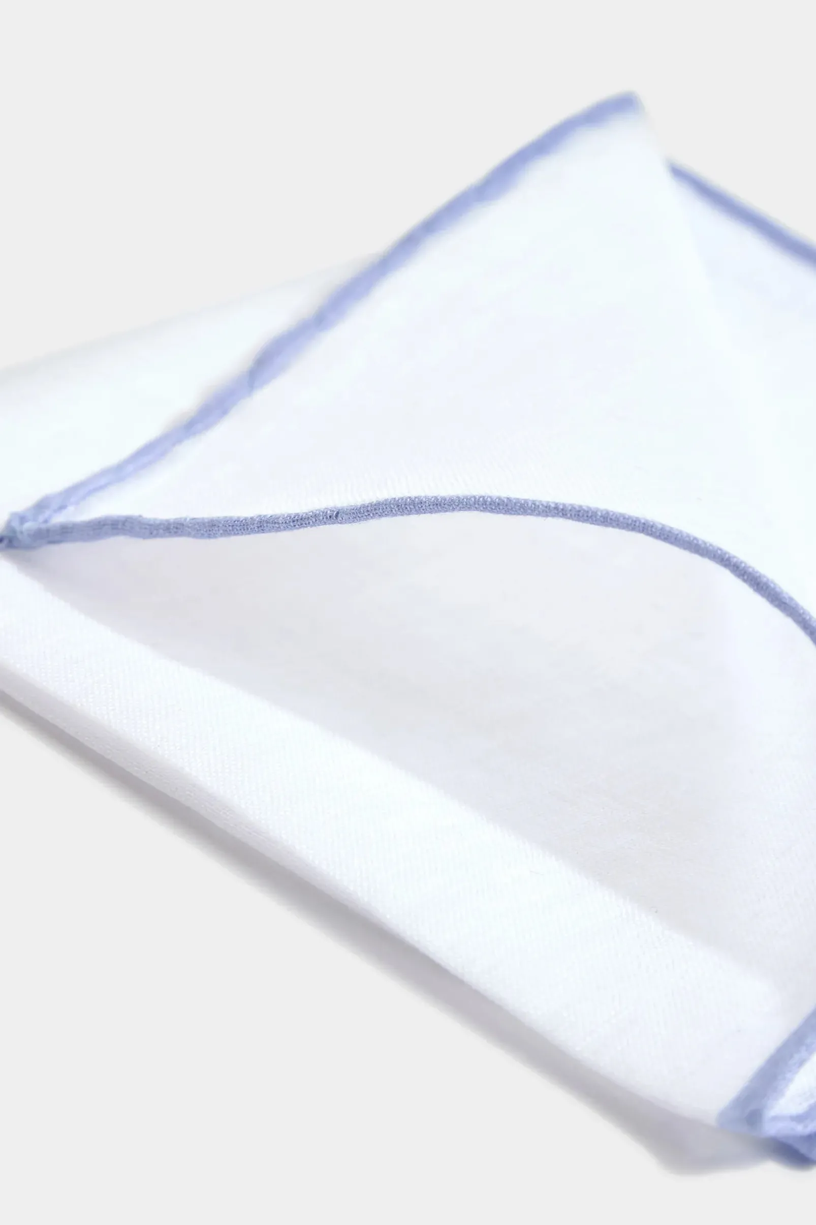 whitelight_blue_linen_poc_1.webp White/Light blue linen pocket square - Made in Italy